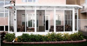 Glass wall and glass roof sunroom
