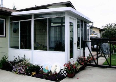 White sunroom with glass and polar insulated panels