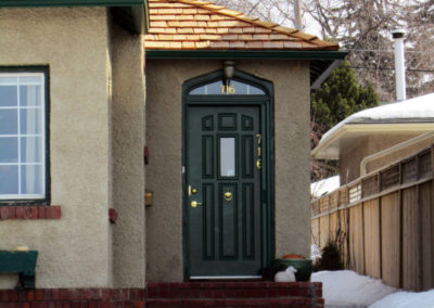 Green insulated door with glass panels